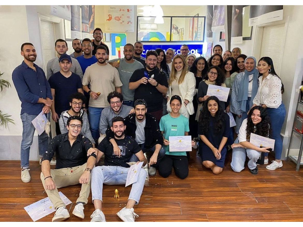 Enas Rashwan with students during graduation Enas Rashwan with students during graduation