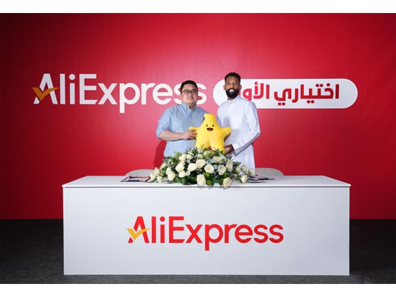 Feras Al Brikan stands alongside Jim Qin, Operations Director for the GCC at AliExpress, holding the AliExpress mascot, to celebrate Feras’ new role as the brand ambassador in the GCC. Feras Al Brikan stands alongside Jim Qin, Operations Director for the GCC at AliExpress, holding the AliExpress mascot, to celebrate Feras’ new role as the brand ambassador in the GCC.
