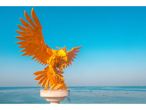 Gold falcon titled, Wusul (Arrival in Arabic) by artist, KWEST Gold falcon titled, Wusul (Arrival in Arabic) by artist, KWEST