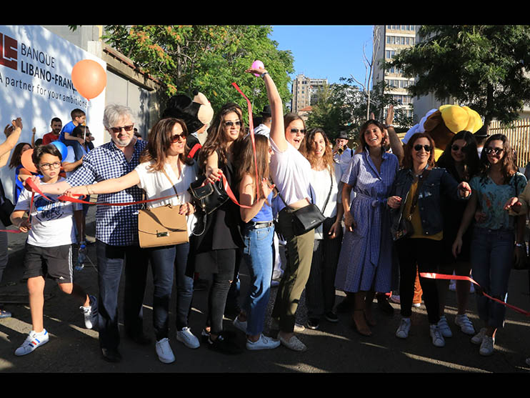 Raya Raphael Nahas, Tania Rizk, members from the management and ALBA students cutting the ribbon Raya Raphael Nahas, Tania Rizk, members from the management and ALBA students cutting the ribbon